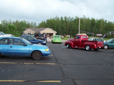 The cars hurry to leave before the rain hits