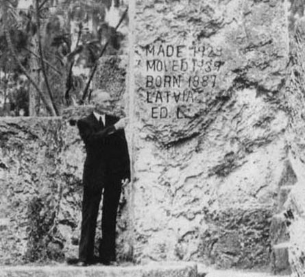 Ed Leedskalnin standing next to the obelisk.